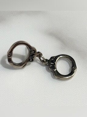 Dino 84/85 Silver Tone Handcuff Brooch Pin